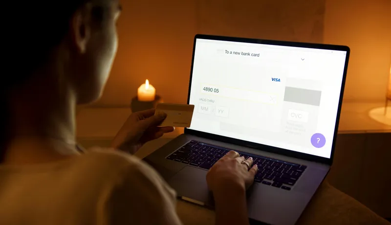 A customer shopping online and paying by card